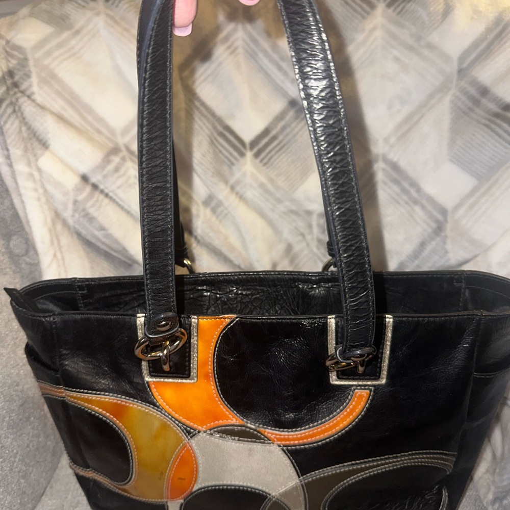 COACH Black Leather Tote Bag with orange, gray and tan accents. F17127